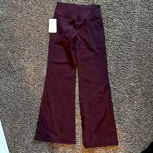 Never worn Athleta Salutation Stash Rib Flare leggings